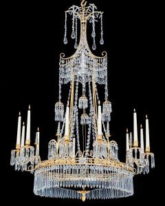  Werner Mieth A GERMAN NEOCLASSICAL SILVER AND GILT BRONZE TWELVE LIGHT CRYSTAL CHANDELIER - 3788047