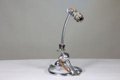  William Benson W A S Benson Co W A S Benson An Arts and Crafts chrome plated table lamp with heart shaped base - 4186308