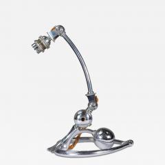 William Benson W A S Benson Co W A S Benson An Arts and Crafts chrome plated table lamp with heart shaped base - 4232958