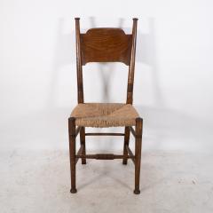  William Birch Ltd William Birch Liberty Co A Arts and Crafts rush seat oak dining chair - 4191464