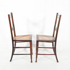  Wylie Lochhead A Pair of Arts Crafts Side Chairs with Stylized Tulip Cut outs to the Back - 4191501