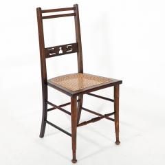  Wylie Lochhead A Pair of Arts Crafts Side Chairs with Stylized Tulip Cut outs to the Back - 4191502