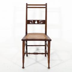  Wylie Lochhead A Pair of Arts Crafts Side Chairs with Stylized Tulip Cut outs to the Back - 4191503