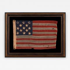 13 Hand Sewn Stars in a 3 2 3 2 3 Pattern on an Antique American Flag - 639627