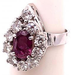 14 Karat White Gold Fashion Oval Ruby Solitaire Ring with Encircling Diamonds - 2831675
