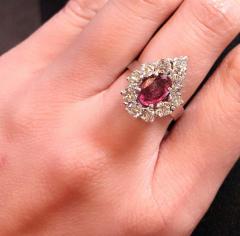 14 Karat White Gold Fashion Oval Ruby Solitaire Ring with Encircling Diamonds - 2831684