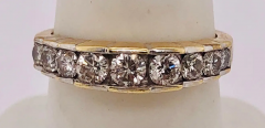 14 Karat Yellow Gold And Graduating Nine Diamond Anniversary Ring 1 00 TDW - 2562671