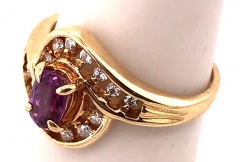 14 Karat Yellow Gold Purple Peridot Ring with Round Diamond Accents 0 14 TDW - 2553900