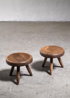 Charlotte Perriand - Pair of Charlotte Perriand low tripod stools