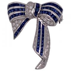18 Karat White Gold Sapphire and Diamond Bow Pin 1 10 TDW - 4515454