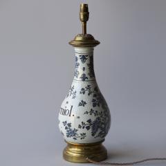 18TH CENTURY FA ENCE BOTTLE CONVERTED TO A TABLE LAMP - 3874470