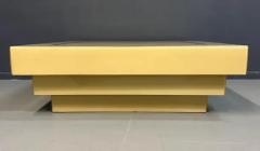 1970s Acrylic Stepped Cream Colored Coffee Table with Brass Ribbon Inlay - 3245043