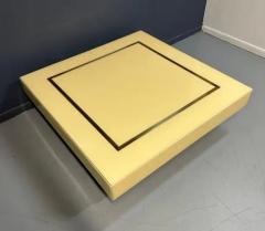 1970s Acrylic Stepped Cream Colored Coffee Table with Brass Ribbon Inlay - 3245046