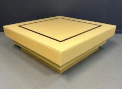 1970s Acrylic Stepped Cream Colored Coffee Table with Brass Ribbon Inlay - 3245060