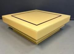 1970s Acrylic Stepped Cream Colored Coffee Table with Brass Ribbon Inlay - 3245063