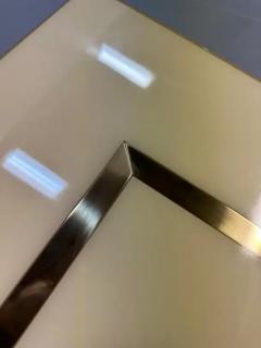 1970s Acrylic Stepped Cream Colored Coffee Table with Brass Ribbon Inlay - 3245066