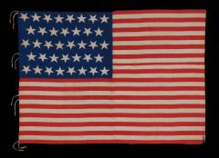 38 Stars and a Very Unusual Complement of 31 Stripes on an Antique American Flag - 671621
