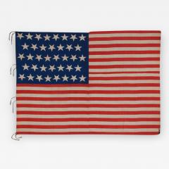 38 Stars and a Very Unusual Complement of 31 Stripes on an Antique American Flag - 672133