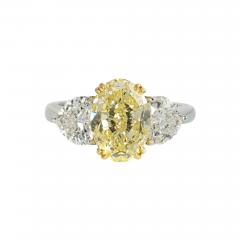 4 CARAT OVAL DIAMOND FANCY LIGHT YELLOW GIA RING - 2310015