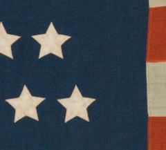 42 Stars in an Hourglass Pattern on an Antique American Flag - 638197