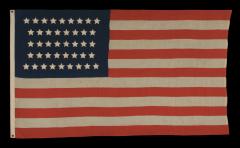 42 Stars in an Hourglass Pattern on an Antique American Flag - 638199