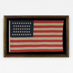 42 Stars in an Hourglass Pattern on an Antique American Flag - 638290