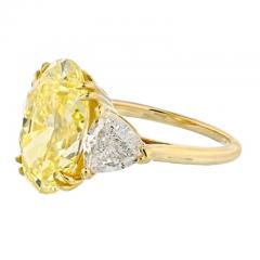 6 CARAT OVAL DIAMOND FANCY INTENSE YELLOW GIA RING - 2926276