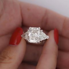 7 68 Carat TW Radiant Cut Trillion Cut Three Stone Engagement Ring - 3862007