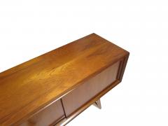 71 Danish Teak Credenza With Sliding Doors on Flared Legs - 4140326