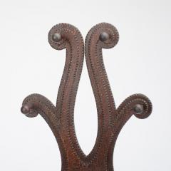 A 19th century Tramp Art hall tree with pipe holder  - 3498284