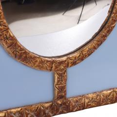 A Blue Glass and Resin Quadrant Wall Mirror  - 4636991