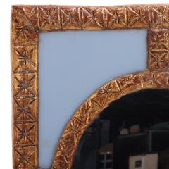 A Blue Glass and Resin Quadrant Wall Mirror  - 4636992