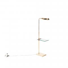 A Brass and glass adjustable floor lamp C 1970  - 2536163