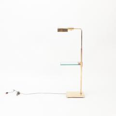 A Brass and glass adjustable floor lamp C 1970  - 2536170