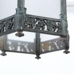 A Bronze lantern with grape and leaf motif and green patina circa 1920 - 2917792