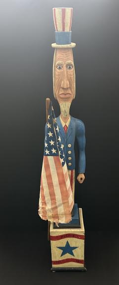 A CARVED AND PAINTED FIGURE OF UNCLE SAM CIRCA 1876 - 4140422
