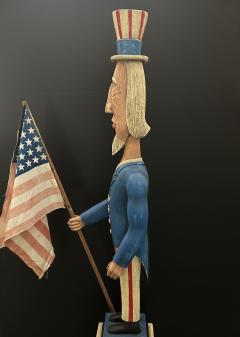 A CARVED AND PAINTED FIGURE OF UNCLE SAM CIRCA 1876 - 4140425