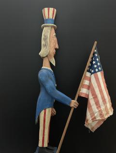 A CARVED AND PAINTED FIGURE OF UNCLE SAM CIRCA 1876 - 4140427