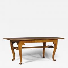 A CHERRYWOOD VENEERED LIBRARY TABLE - 3543842