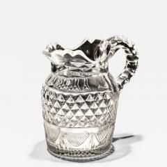 A CUT GLASS IRISH CREAM JUG - 4344270