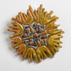 A Ceramic Sun Plaque - 3585759