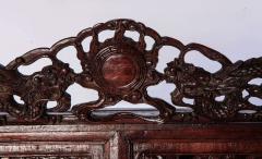 A Chinese small openwork wood cabinet depicting Dragons - 2706311