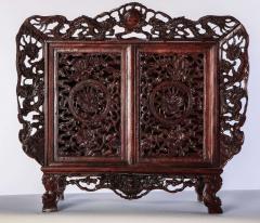 A Chinese small openwork wood cabinet depicting Dragons - 3943533