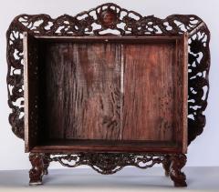 A Chinese small openwork wood cabinet depicting Dragons - 3943534