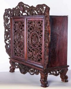 A Chinese small openwork wood cabinet depicting Dragons - 3943538