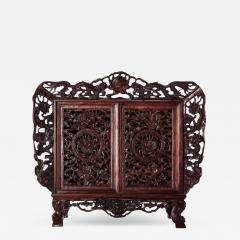 A Chinese small openwork wood cabinet depicting Dragons - 3944559