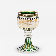 A EMERALD GREEN WHITE OVERLAID GOBLET WITH GILT DECORATION - 3800024