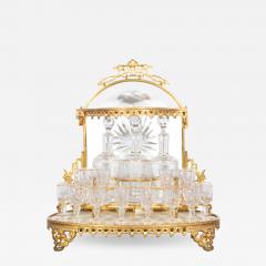 A FINE FRENCH BACCARAT GILT BRONZE CRYSTAL CHINOISERIE DECORATED LIQOUR SET - 3560137