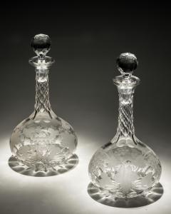 A FINE PAIR OF ENGRAVED SHAFT GLOBE DECANTERS - 4340881