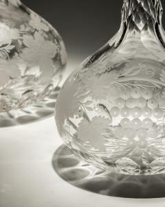 A FINE PAIR OF ENGRAVED SHAFT GLOBE DECANTERS - 4340910